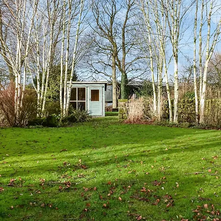Holiday home Woodbine *